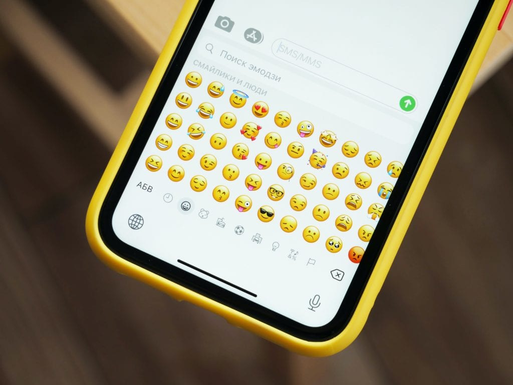 Using your phone to include emojis in your business social media posts can be a little easier than typing on a desktop computer. 